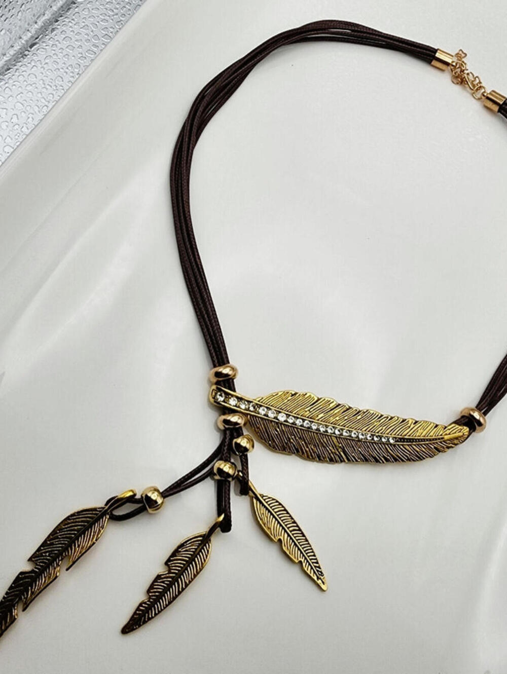 Wayfarer's Quill Gold Feather Boho Rhinestone Necklace